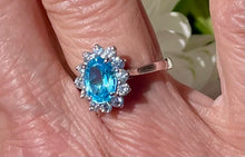 Load image into Gallery viewer, Oval Blue Topaz and Diamond Cluster Ring in 18ct White Gold