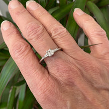 Load image into Gallery viewer, Emerald and Tapered Baguette Cut Diamond Ring in Platinum
