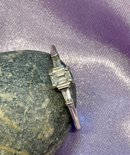 Load image into Gallery viewer, Emerald and Tapered Baguette Cut Diamond Ring in Platinum