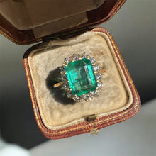Load image into Gallery viewer, Emerald and Diamond Halo Ring