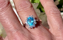 Load image into Gallery viewer, Oval Blue Topaz and Diamond Cluster Ring in 18ct White Gold