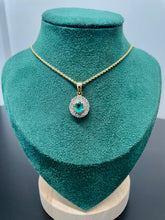 Load image into Gallery viewer, Oval Cut Emerald and Double Halo Diamond Pendant with Chain in 18ct Yellow Gold