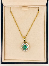Load image into Gallery viewer, Oval Cut Emerald and Double Halo Diamond Pendant with Chain in 18ct Yellow Gold