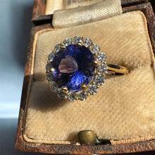 Load image into Gallery viewer, Tanzanite and Diamond Halo Ring