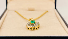 Load image into Gallery viewer, Oval Cut Emerald and Double Halo Diamond Pendant with Chain in 18ct Yellow Gold