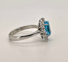 Load image into Gallery viewer, Oval Blue Topaz and Diamond Cluster Ring in 18ct White Gold