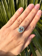 Load image into Gallery viewer, Aquamarine and Diamond Halo Ring
