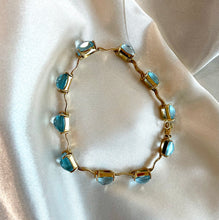 Load image into Gallery viewer, Briolette Cut Blue Topaz Bracelet in 9ct Yellow Gold
