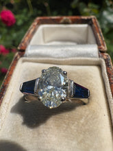 Load image into Gallery viewer, 1.54ct Oval Diamond Ring with Sapphire Accents
