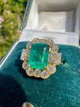 Load image into Gallery viewer, Vivid Emerald and Diamond Halo Ring in 18ct Gold
