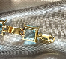 Load image into Gallery viewer, Briolette Cut Blue Topaz Bracelet in 9ct Yellow Gold
