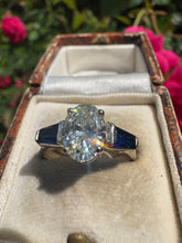 Load image into Gallery viewer, 1.54ct Oval Diamond Ring with Sapphire Accents
