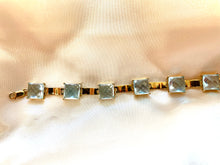 Load image into Gallery viewer, Briolette Cut Blue Topaz Bracelet in 9ct Yellow Gold
