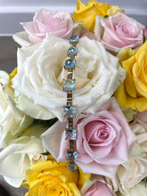 Load image into Gallery viewer, Briolette Cut Blue Topaz Bracelet in 9ct Yellow Gold
