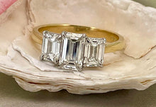 Load image into Gallery viewer, Trilogy Emerald Cut Diamonds in 18ct Yellow Gold and Platinum
