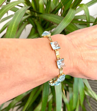 Load image into Gallery viewer, Briolette Cut Blue Topaz Bracelet in 9ct Yellow Gold
