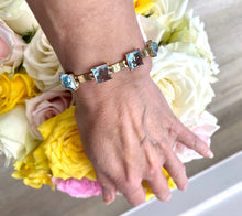 Load image into Gallery viewer, Briolette Cut Blue Topaz Bracelet in 9ct Yellow Gold
