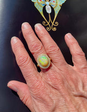 Load image into Gallery viewer, Oval Opal and Diamond Halo Ring in 18ct Yellow Gold
