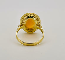 Load image into Gallery viewer, Oval Opal and Diamond Halo Ring in 18ct Yellow Gold
