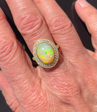 Load image into Gallery viewer, Oval Opal and Diamond Halo Ring in 18ct Yellow Gold
