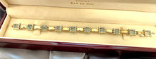 Load image into Gallery viewer, Briolette Cut Blue Topaz Bracelet in 9ct Yellow Gold
