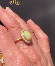 Load image into Gallery viewer, Oval Opal and Diamond Halo Ring in 18ct Yellow Gold
