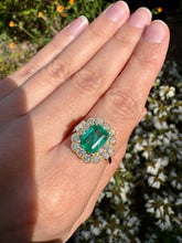 Load image into Gallery viewer, Vivid Emerald and Diamond Halo Ring in 18ct Gold
