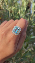 Load and play video in Gallery viewer, Vintage Aquamarine &amp; Diamond Halo Ring in 18ct Gold
