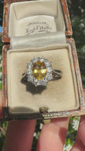 Load and play video in Gallery viewer, Glowing Yellow Sapphire and Diamond Halo Ring
