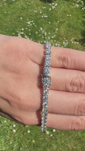 Load and play video in Gallery viewer, Platinum GIA Certified Diamond Tennis Bracelet – VS Clarity, G Colour
