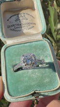 Load and play video in Gallery viewer, Platinum Diamond Halo Ring with Diamond Shoulders
